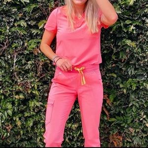 FIGS hot coral joggers